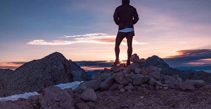 ways to reach your full potential, man on top of a mountain