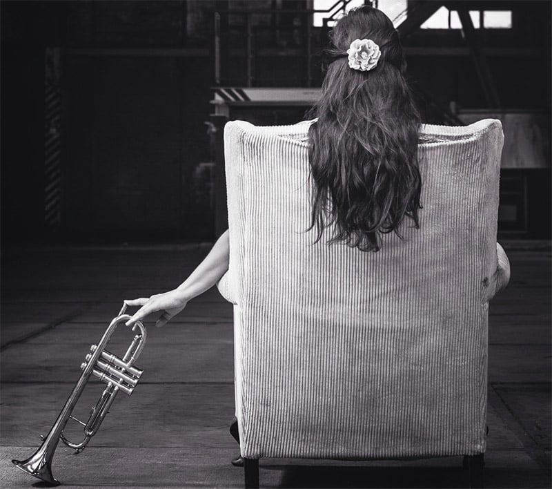 creative block, woman standing in a chair